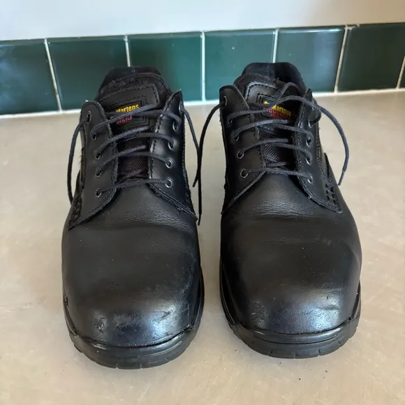 Black leather Dr. Martens industrial steel toe shoes men’s US size 10 women’s 11