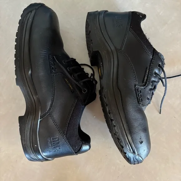 Black leather Dr. Martens industrial steel toe shoes men’s US size 10 women’s 11