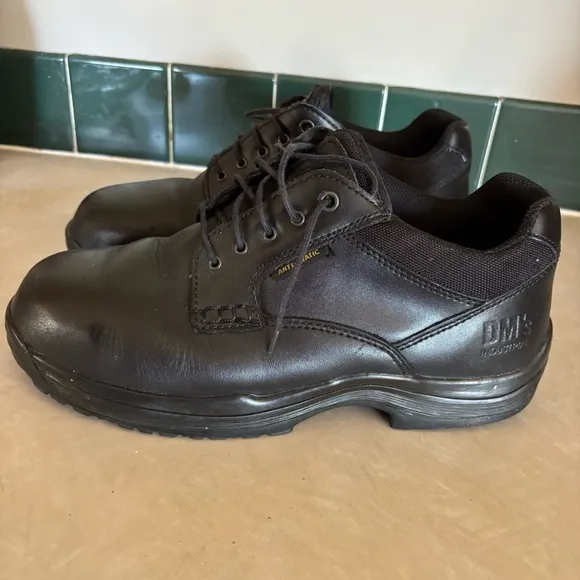 Black leather Dr. Martens industrial steel toe shoes men’s US size 10 women’s 11