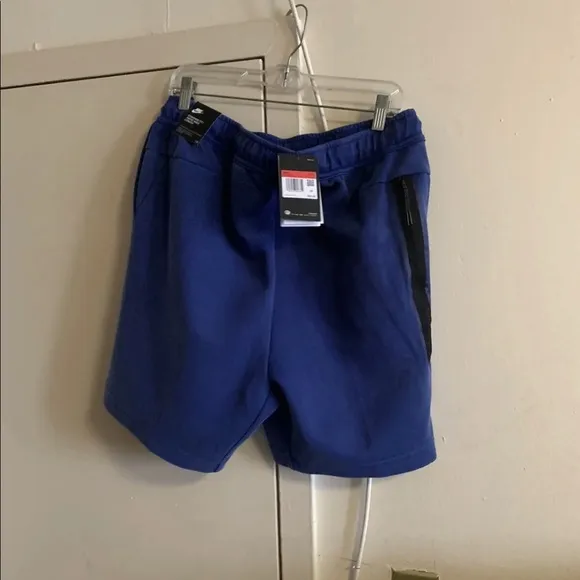Brand new authentic Nike tech shorts in blue sizes M,L&amp;Xl available