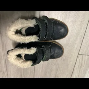 Gently used boy UGG boots