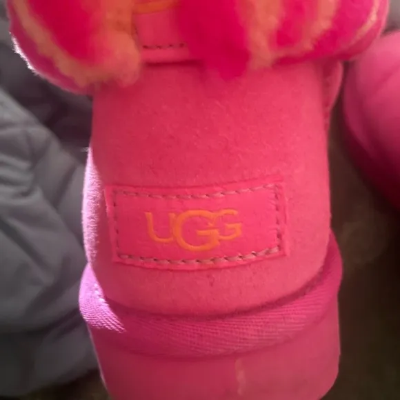 Hot pink zebra and orange print mini boots UGG