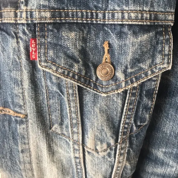 “Ltd .collection”  Blue denim jacket by Levi Strauss &amp; Sons with RED INSULATION.
