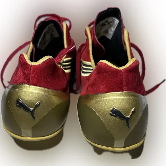 Mens Puma Complete Theseus Track And Field Shoes size 11 1/2. Red Suede and Gold