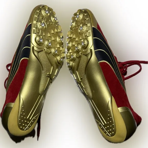 Mens Puma Complete Theseus Track And Field Shoes size 11 1/2. Red Suede and Gold