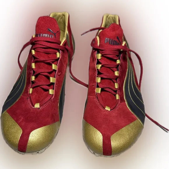 Mens Puma Complete Theseus Track And Field Shoes size 11 1/2. Red Suede and Gold