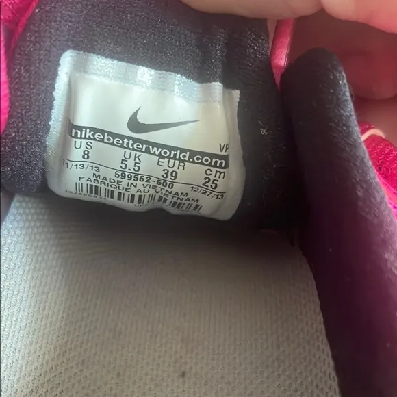 Nike Pink and Silver Athletic Shoes with Sleek Design
