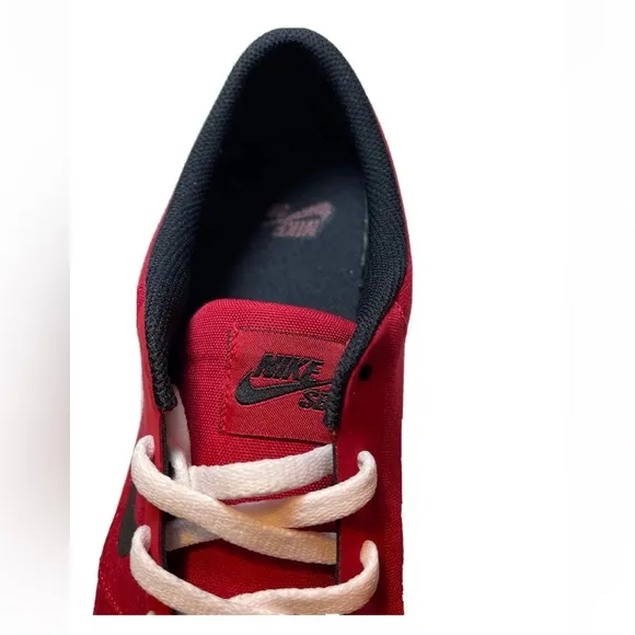 NIKE SB Portmore Red Black White Canvas Low Top Skate Shoe