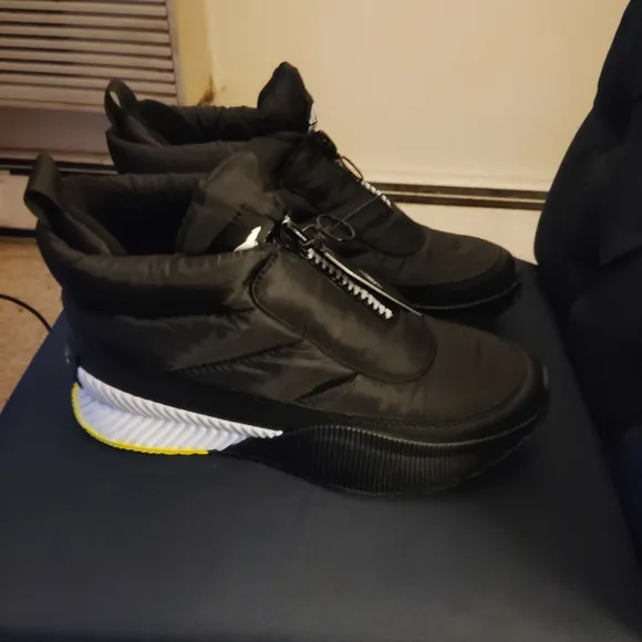 SOREL Out and About Zip Up Puffy Ankle Boots