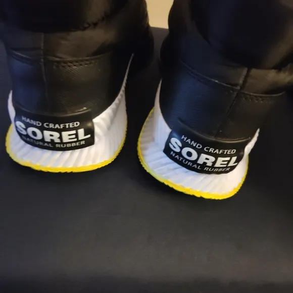 SOREL Out and About Zip Up Puffy Ankle Boots