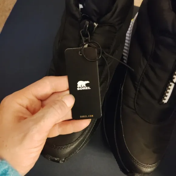 SOREL Out and About Zip Up Puffy Ankle Boots