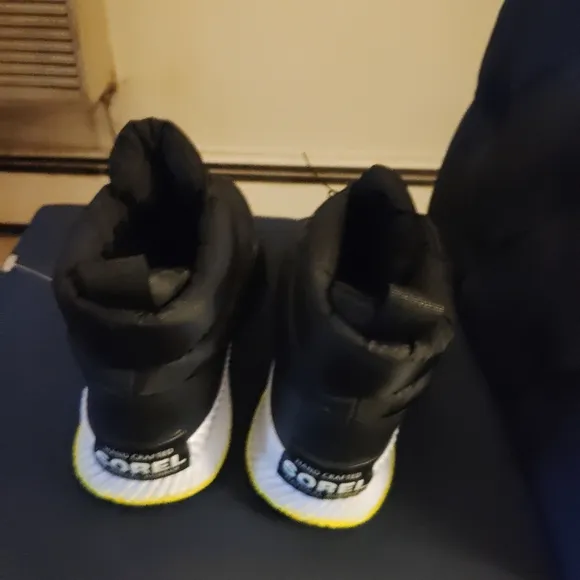 SOREL Out and About Zip Up Puffy Ankle Boots