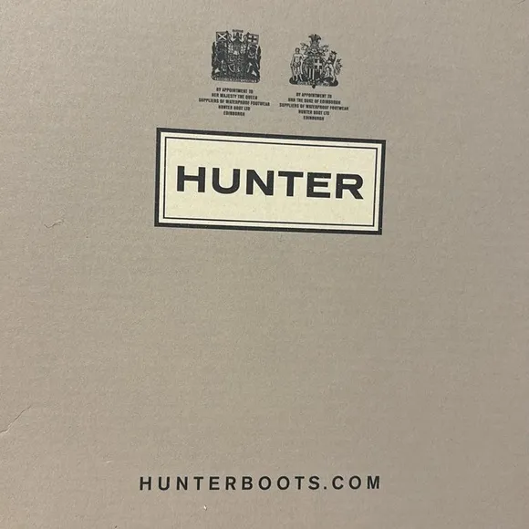 These are a pair of all black insulated Hunter snow boots size 1