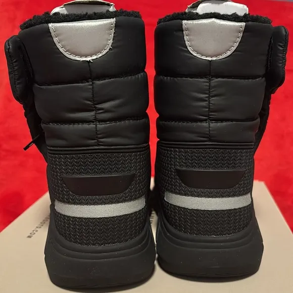 These are a pair of all black insulated Hunter snow boots size 1
