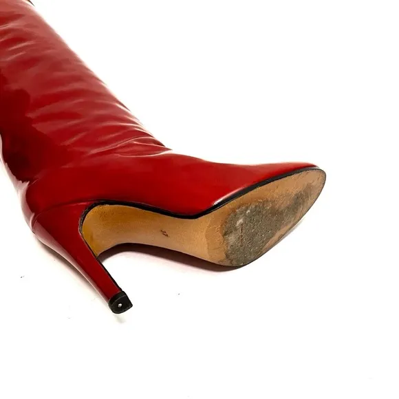 Vintage 1970s cinnamon brown patent leather pull on knee high stiletto boots